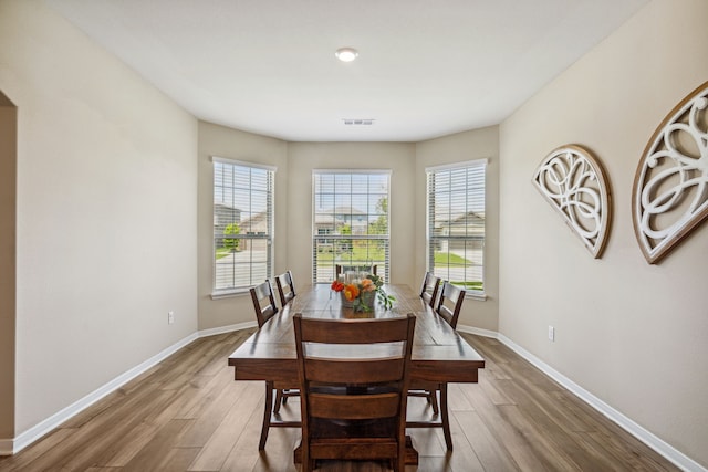203 Lake Rdg, Princeton, TX 75407 - dining area featuring wood finished floors and baseboards