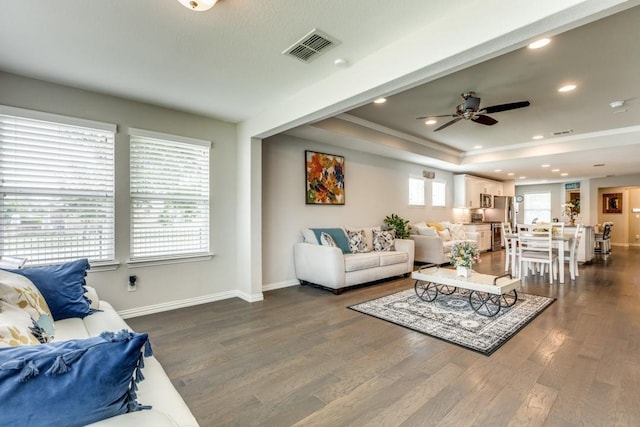 7812 Gulf Breeze Ln, Frisco, TX 75036 - living room featuring dark wood-style floors, a raised ceiling, a ceiling fan, recessed lighting, and baseboards