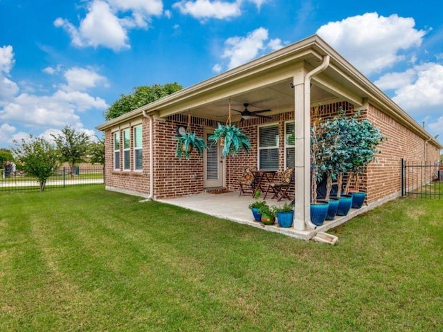 7812 Gulf Breeze Ln, Frisco, TX 75036 - back of house featuring a ceiling fan, brick siding, and a patio area