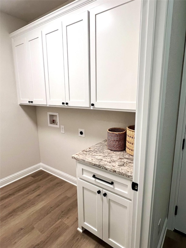 358 Frederick Dr, Robinson, TX 76706 - washroom with hookup for a washing machine, cabinet space, hookup for an electric dryer, dark wood-style floors, and baseboards