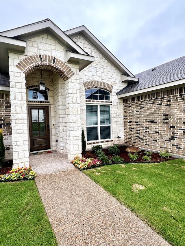 358 Frederick Dr, Robinson, TX 76706 - entrance to property with stone siding, a lawn, and brick siding