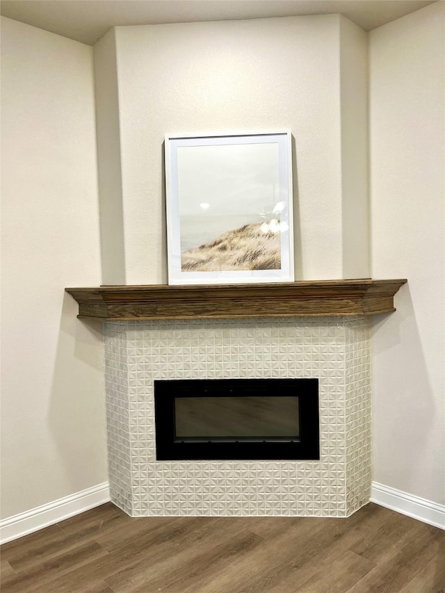 358 Frederick Dr, Robinson, TX 76706 - detailed view of a fireplace, wood finished floors, and baseboards