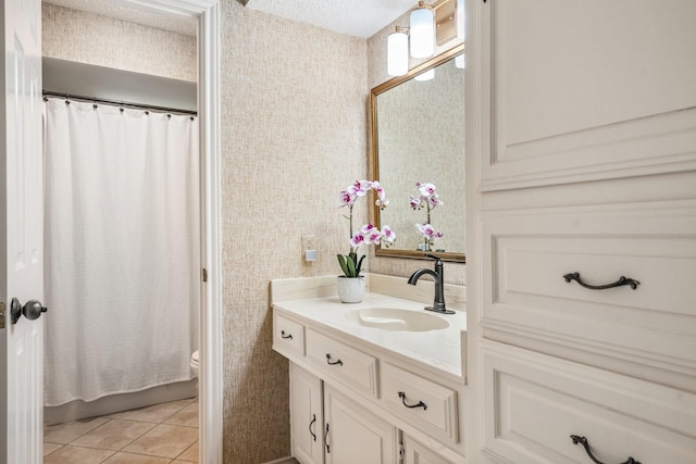 6737 Lake Shore Dr, Garland, TX 75044 - full bath with vanity, tile patterned flooring, and curtained shower