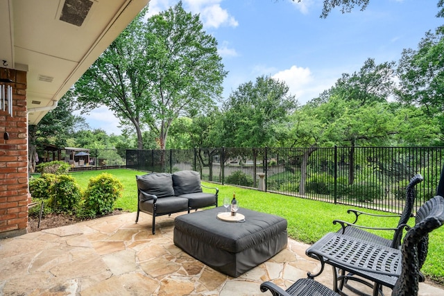 6737 Lake Shore Dr, Garland, TX 75044 - fenced backyard with a patio area, an outdoor hangout area, and view of scattered trees