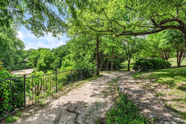 6737 Lake Shore Dr, Garland, TX 75044 - view of street featuring a view of trees