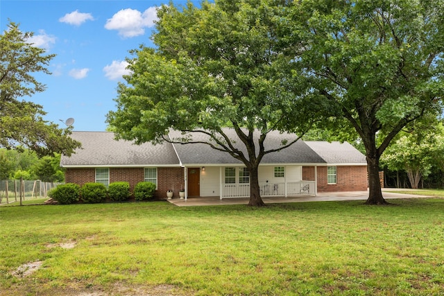 2144 County Road 4535, Whitewright, TX 75491 - view of front of property featuring brick siding and roof with shingles