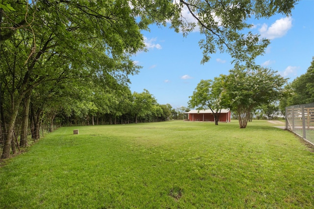 2144 County Road 4535, Whitewright, TX 75491 - view of green lawn featuring an outbuilding
