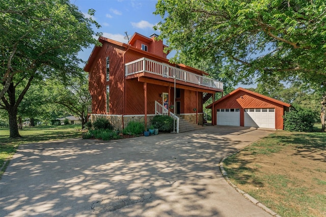 7317 E Fm 917, Alvarado, TX 76009 - view of front of property featuring an outbuilding, a chimney, concrete driveway, and a wooden deck