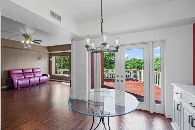 7317 E Fm 917, Alvarado, TX 76009 - dining area featuring a chandelier, dark wood-type flooring, a ceiling fan, and french doors