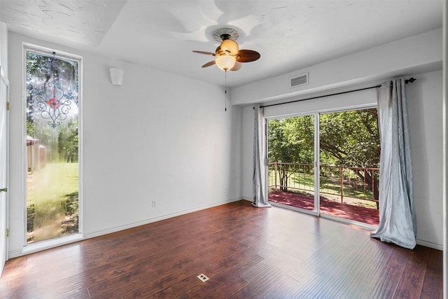 7317 E Fm 917, Alvarado, TX 76009 - unfurnished room featuring healthy amount of natural light, a ceiling fan, and wood finished floors