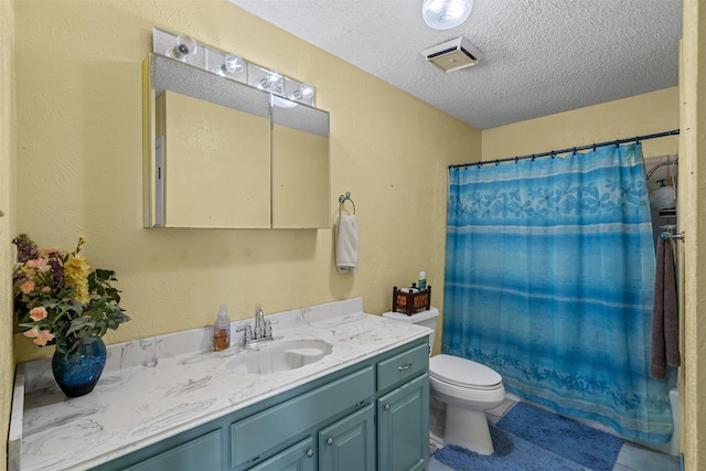 7317 E Fm 917, Alvarado, TX 76009 - full bathroom with vanity, toilet, a textured ceiling, and tile patterned floors