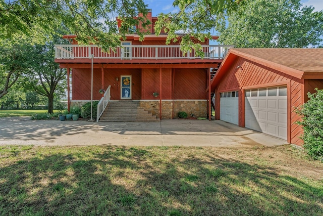 7317 E Fm 917, Alvarado, TX 76009 - view of front facade with a garage, a wooden deck, driveway, a front lawn, and stone siding