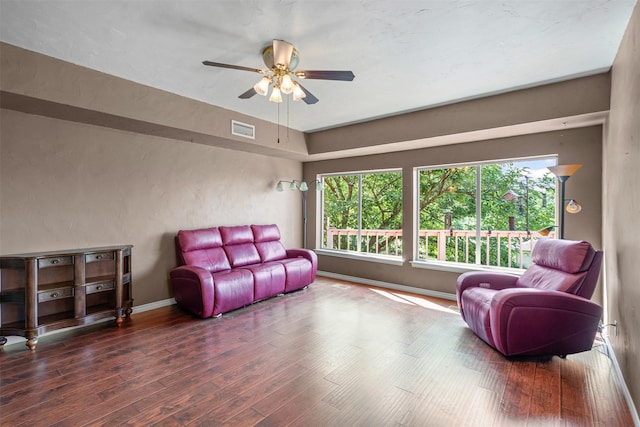 7317 E Fm 917, Alvarado, TX 76009 - sitting room with a ceiling fan, wood finished floors, and healthy amount of natural light