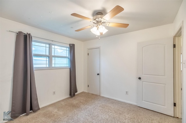 25 Spears Cir, Abilene, TX 79601 - unfurnished bedroom featuring light colored carpet, baseboards, and ceiling fan