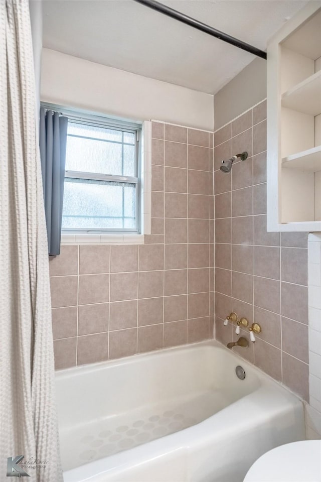 25 Spears Cir, Abilene, TX 79601 - bathroom featuring shower / bath combo with shower curtain and toilet