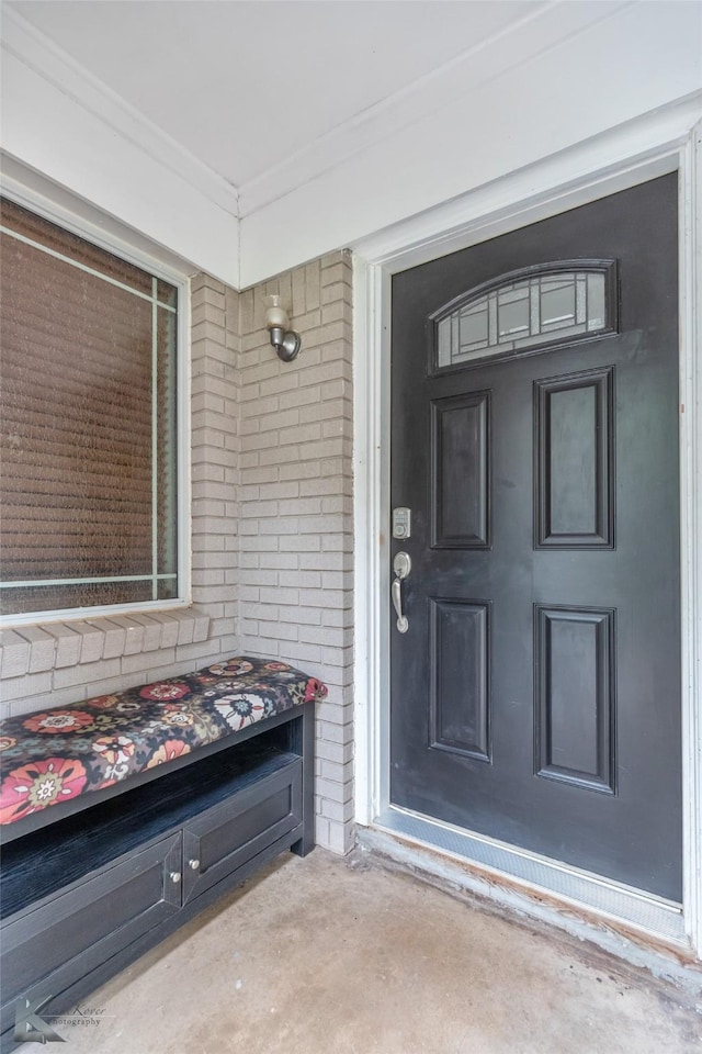 25 Spears Cir, Abilene, TX 79601 - doorway to property featuring brick siding