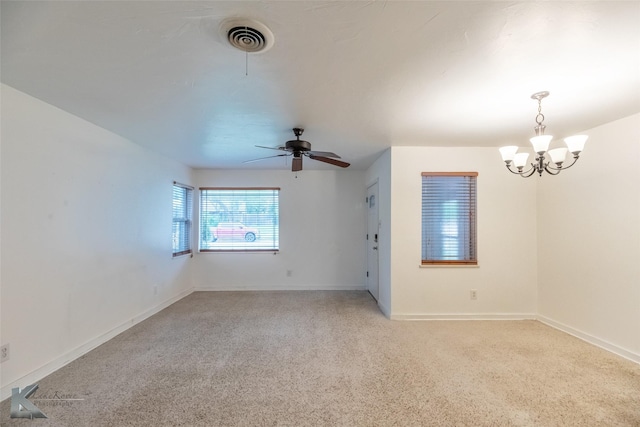 25 Spears Cir, Abilene, TX 79601 - empty room with light colored carpet, a chandelier, baseboards, and a ceiling fan