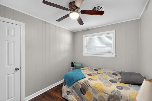 5405 Westhaven Dr, Fort Worth, TX 76132 - bedroom with crown molding, dark wood-style flooring, a ceiling fan, and baseboards