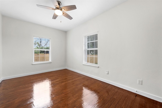 1608 N 17th St, Waco, TX 76707 - empty room with wood finished floors, a ceiling fan, and baseboards