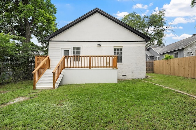 1608 N 17th St, Waco, TX 76707 - back of house with a deck, brick siding, crawl space, and stairway