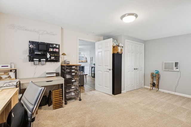 559 Bell Dr, Allen, TX 75002 - home office with light carpet, baseboards, and a wall mounted air conditioner