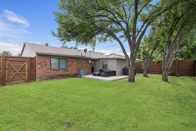 559 Bell Dr, Allen, TX 75002 - back of house with a gate, an outdoor hangout area, a patio, brick siding, and roof with shingles