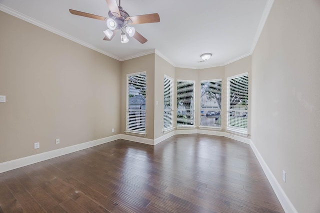 7605 Chief Spotted Tail Dr, Mckinney, TX 75070 - spare room featuring dark wood-style flooring, ceiling fan, ornamental molding, and baseboards