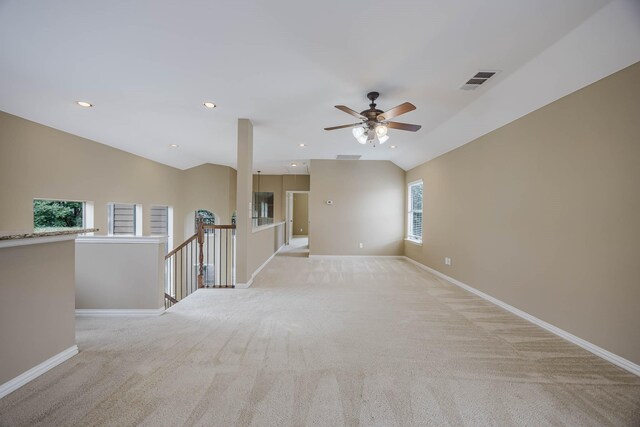 7605 Chief Spotted Tail Dr, Mckinney, TX 75070 - unfurnished room featuring light colored carpet, baseboards, ceiling fan, recessed lighting, and lofted ceiling