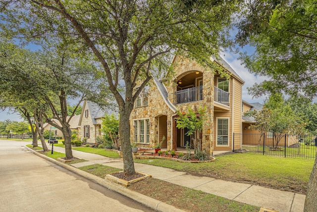 7605 Chief Spotted Tail Dr, Mckinney, TX 75070 - view of front of home featuring a balcony and stone siding