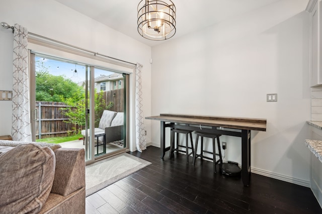 4213 Tallulah Dr, Plano, TX 75074 - dining space featuring a chandelier, baseboards, and dark wood finished floors