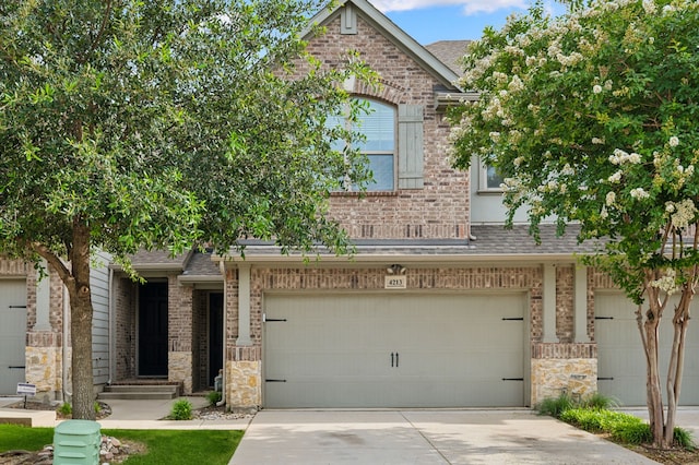 4213 Tallulah Dr, Plano, TX 75074 - view of front of property with brick siding, roof with shingles, concrete driveway, and a garage