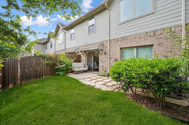 4213 Tallulah Dr, Plano, TX 75074 - rear view of property with brick siding and a patio