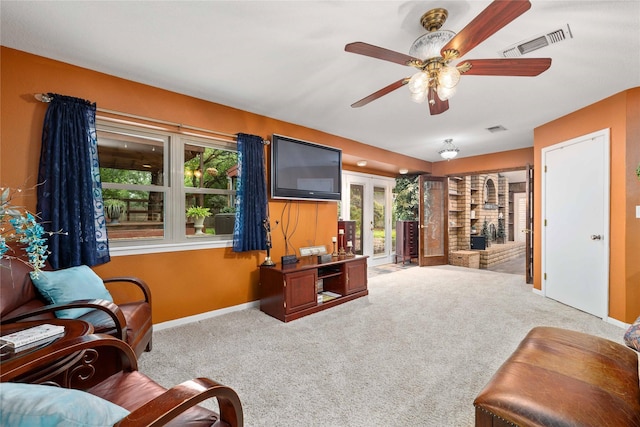 2514 Good Shepherd Dr, Brownwood, TX 76801 - carpeted living room featuring healthy amount of natural light, baseboards, and a ceiling fan