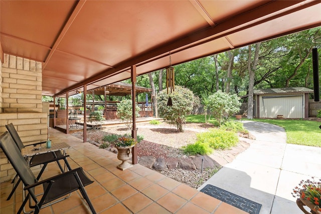 2514 Good Shepherd Dr, Brownwood, TX 76801 - fenced backyard with a patio and an outdoor structure