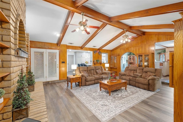 2514 Good Shepherd Dr, Brownwood, TX 76801 - living room featuring ceiling fan, wood finished floors, and wood walls