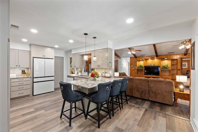 2514 Good Shepherd Dr, Brownwood, TX 76801 - dining room with a ceiling fan, light wood-style floors, recessed lighting, and beam ceiling