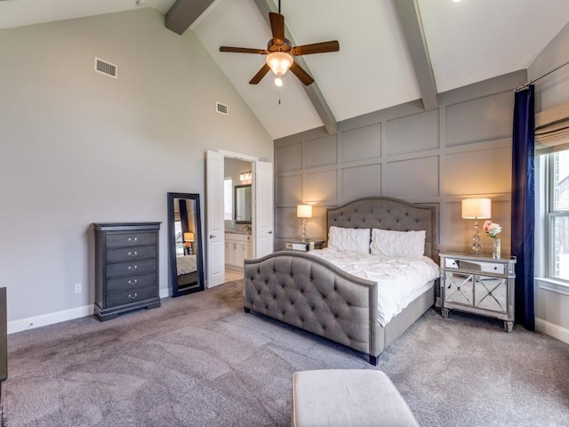 3051 Kennington Dr, Prosper, TX 75078 - carpeted bedroom with beam ceiling, high vaulted ceiling, baseboards, ensuite bath, and ceiling fan