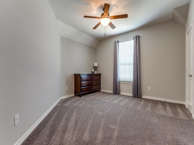 3051 Kennington Dr, Prosper, TX 75078 - unfurnished bedroom with vaulted ceiling, carpet, baseboards, and a ceiling fan