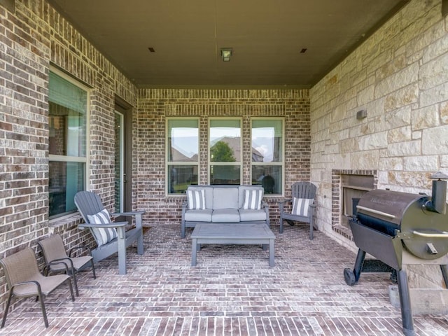 3051 Kennington Dr, Prosper, TX 75078 - view of patio with an outdoor living space with a fireplace and grilling area