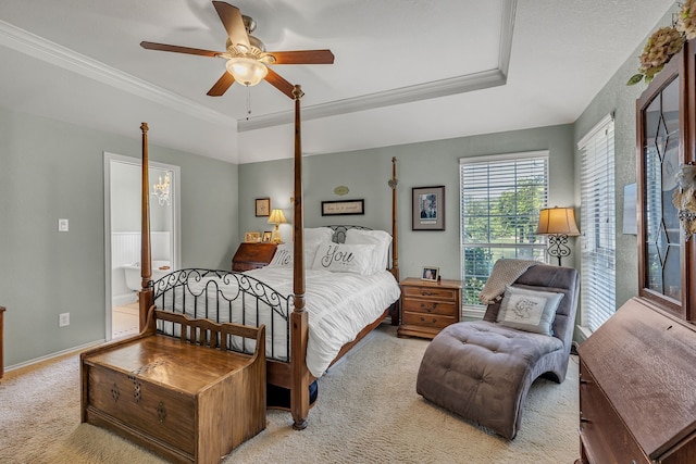 9712 Elm Creek Way, Fort Worth, TX 76140 - carpeted bedroom with a tray ceiling, crown molding, ceiling fan, baseboards, and ensuite bathroom
