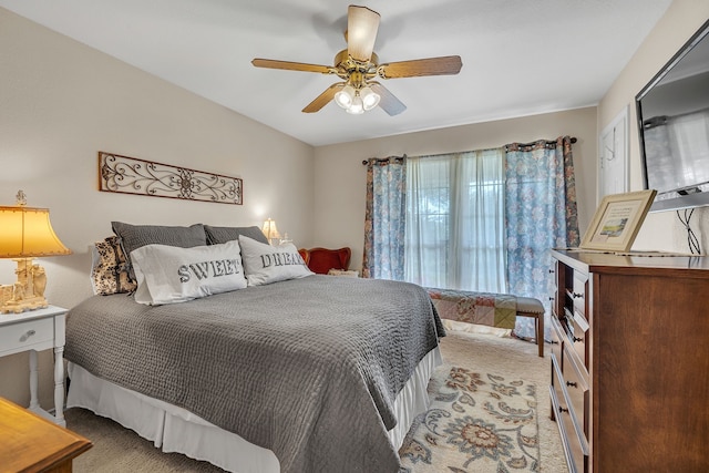 9712 Elm Creek Way, Fort Worth, TX 76140 - bedroom with light carpet and a ceiling fan
