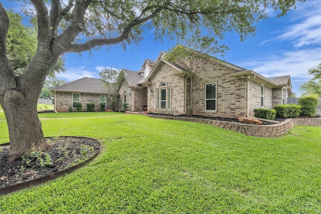 403 Gibraltar Ln, Lorena, TX 76655 - view of front facade featuring brick siding and a front yard