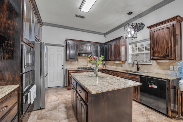 403 Gibraltar Ln, Lorena, TX 76655 - kitchen with appliances with stainless steel finishes, a sink, crown molding, tasteful backsplash, and dark brown cabinetry