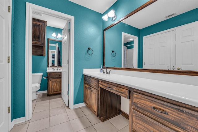 403 Gibraltar Ln, Lorena, TX 76655 - bathroom with toilet, tile patterned floors, vanity, and baseboards