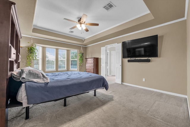 403 Gibraltar Ln, Lorena, TX 76655 - carpeted bedroom with a tray ceiling, ornamental molding, baseboards, and a ceiling fan