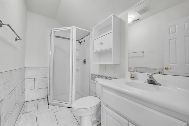 403 Gibraltar Ln, Lorena, TX 76655 - bathroom featuring a shower stall, vanity, toilet, marble finish floors, and tile walls