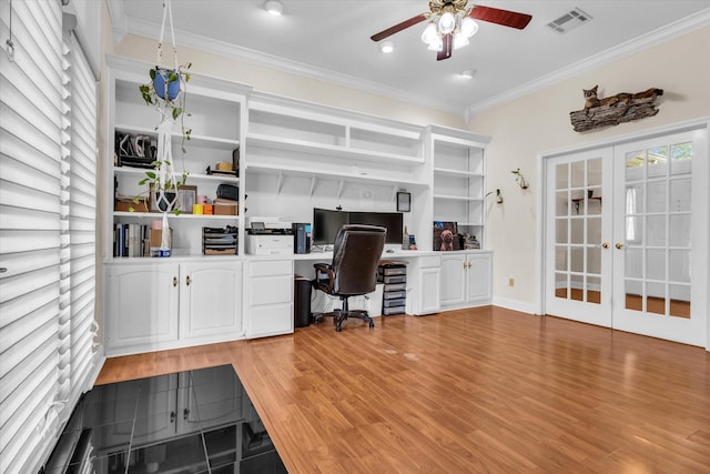 403 Gibraltar Ln, Lorena, TX 76655 - office area featuring ceiling fan, crown molding, built in study area, french doors, and light wood-type flooring