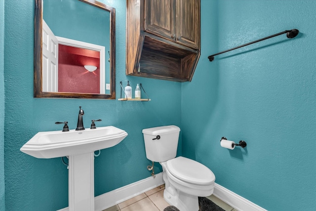 403 Gibraltar Ln, Lorena, TX 76655 - bathroom with tile patterned floors, toilet, and baseboards