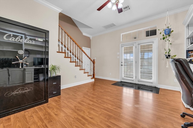 403 Gibraltar Ln, Lorena, TX 76655 - entrance foyer featuring ornamental molding, stairs, a ceiling fan, baseboards, and wood finished floors