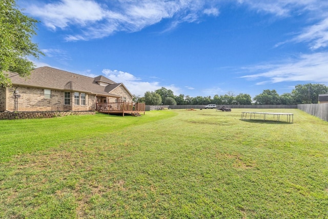 403 Gibraltar Ln, Lorena, TX 76655 - view of yard featuring a trampoline and a deck